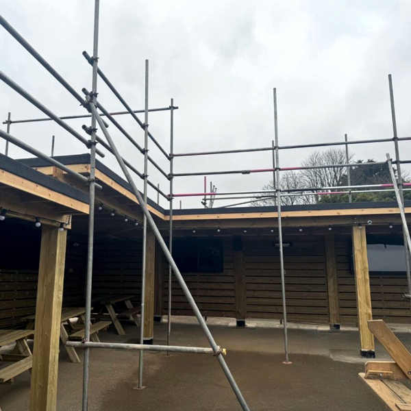 Scaffolding erected around modern bungalow - Scaffolding services in Torquay, Devon, by ACME Plus